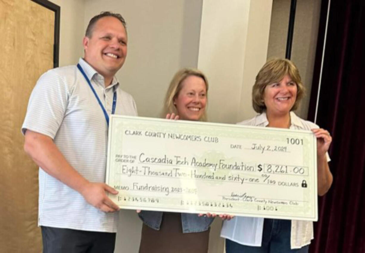 Dave Cole, executive director of the Cascadia Tech Academy Foundation, left, with Kim Chenault and Robin Bean, co-chairs of the Clark County Newcomers club Fundraising Committee.