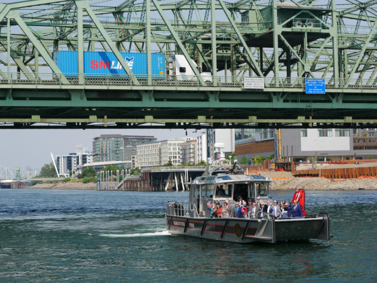 Officials take a closer look at the Interstate 5 Bridge following a celebration of $1.5 billion in new federal funding toward replacing the century-old structure.