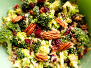 With broccoli, bacon, cheese, nuts and cranberries, this crunch-tangy-sweet broccoli salad is a winner.