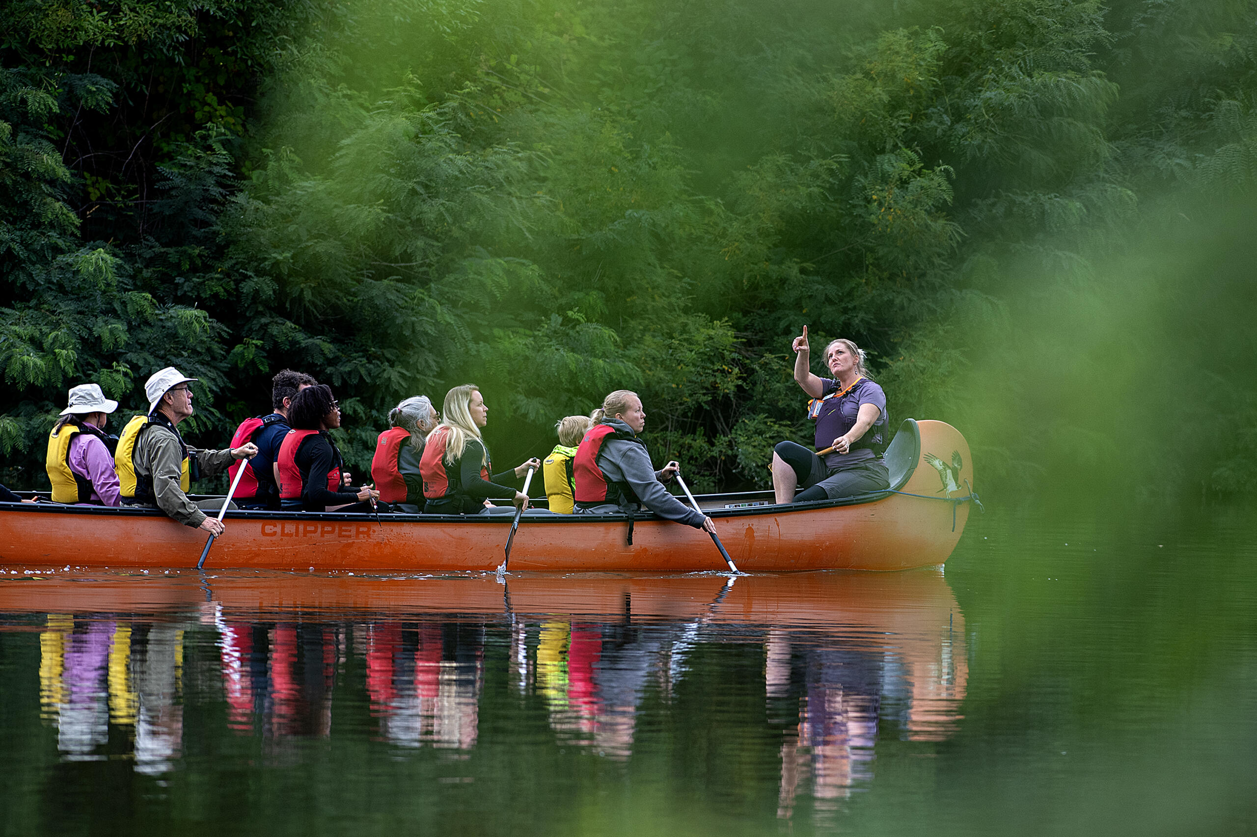 Rainy Rau of the Water Resources Education Center leads a canoe tour after leaving Felida Moorage &amp; Marine Services on Thursday morning, Aug. 22, 2024. Paddlers had the opportunity to learn about wildlife, water quality and treatment plans for the algae during the excursion.