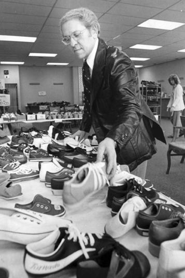 Earl Horenstein arranges stock at Spellman’s Shoes in 1978. The building later was home to Spanky’s Legendary Consignment store and has been vacant since Spanky’s closed.