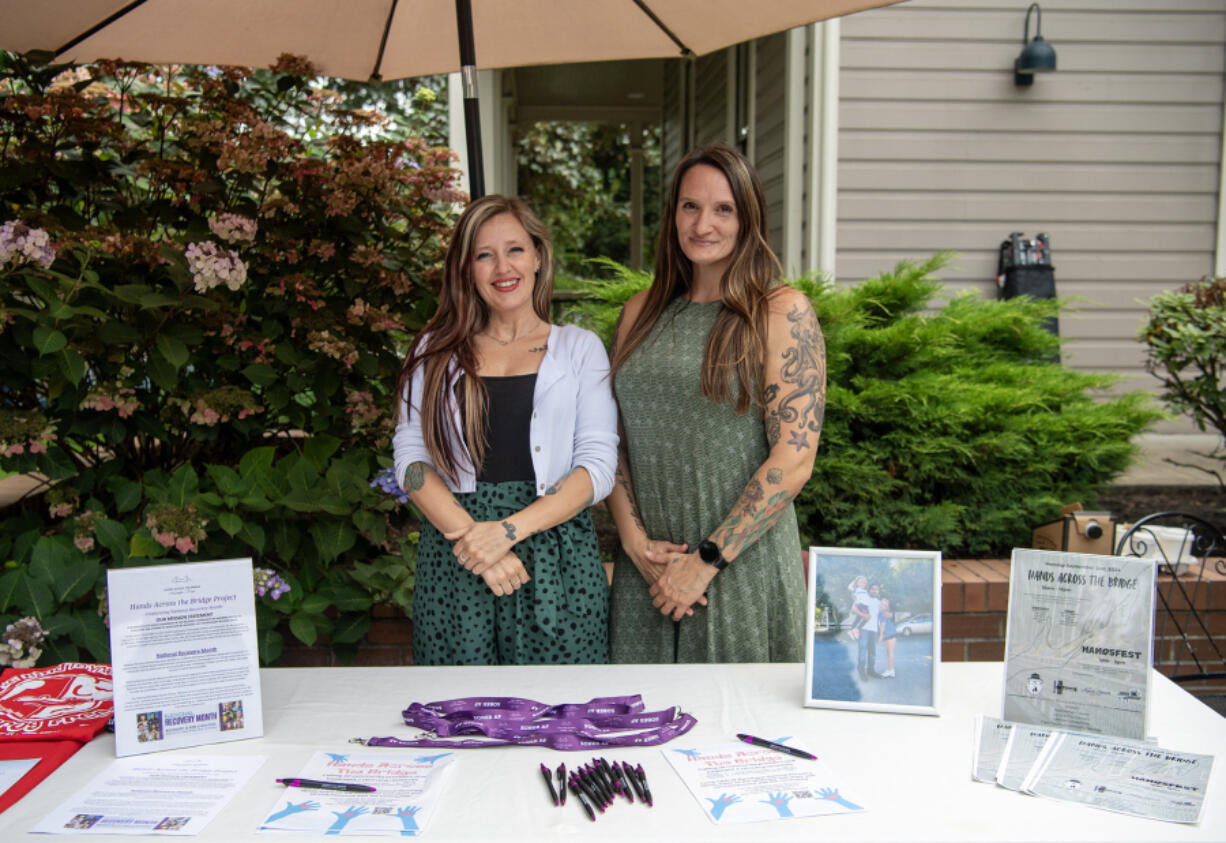 Tabby Stokes, left, and Alizz Quarles, serve as chairwoman and vice chairwoman of Hands Across the Bridge. The event celebrating addiction recovery begins at 10 a.m. Monday in Esther Short Park.