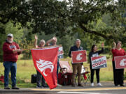 Washington State University Vancouver supporters and faculty greet students on the first day of classes Monday morning.