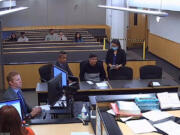 Oscar Martinez Serna Jr., 19, of Vancouver, center, appears Wednesday in Clark County Superior Court on a summons for a charge of hit-and-run resulting in death. He&rsquo;s accused of striking a pedestrian in March who was crossing Fourth Plain Boulevard outside of a crosswalk and leaving the scene after he said he couldn&rsquo;t locate any victim.