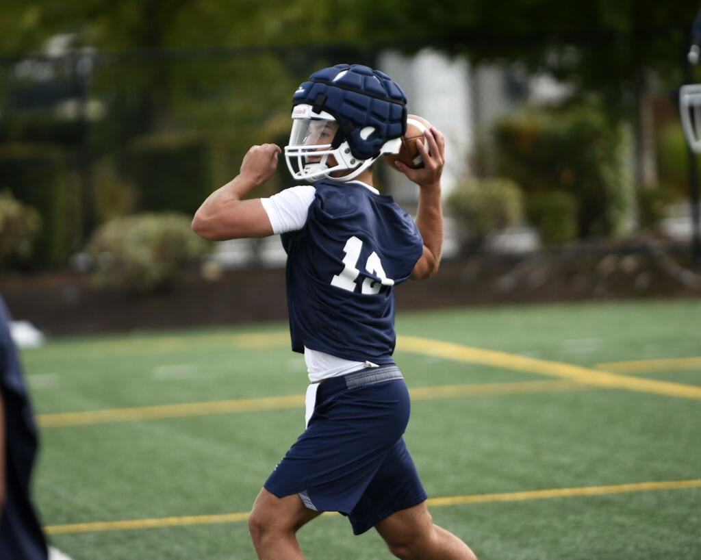 Kolten Gesser of Seton Catholic goes through drills on the first day of football practice at Seton High School on Wednesday, Aug. 21, 2024.