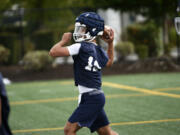 Kolten Gesser of Seton Catholic goes through drills on the first day of football practice at Seton High School on Wednesday, Aug. 21, 2024.