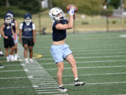 Joe Callerame of Seton Catholic goes through drills on the first day of football practice at Seton High School on Wednesday, Aug. 21, 2024.