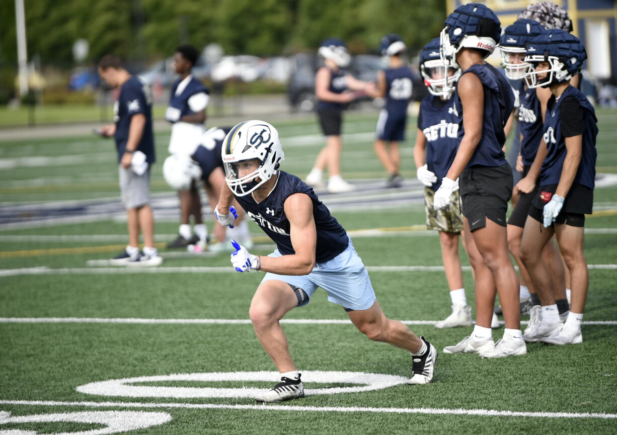 Joe Callerame of Seton Catholic goes through drills on the first day of football practice at Seton High School on Wednesday, Aug. 21, 2024.