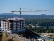 A large crane towers over The Ledges at Palisades under-construction as part of east Vancouver&rsquo;s Columbia Palisades project.