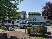 Visitors to Columbia Riverfront RV Park in Woodland enjoy sunshine Wednesday. The Port of Woodland recently purchased the property and will maintain it as an RV park.