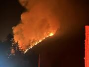 A fire on the Olympic Peninsula south of Olympia has forced some evacuations as it spread to more than 2,000 acres.