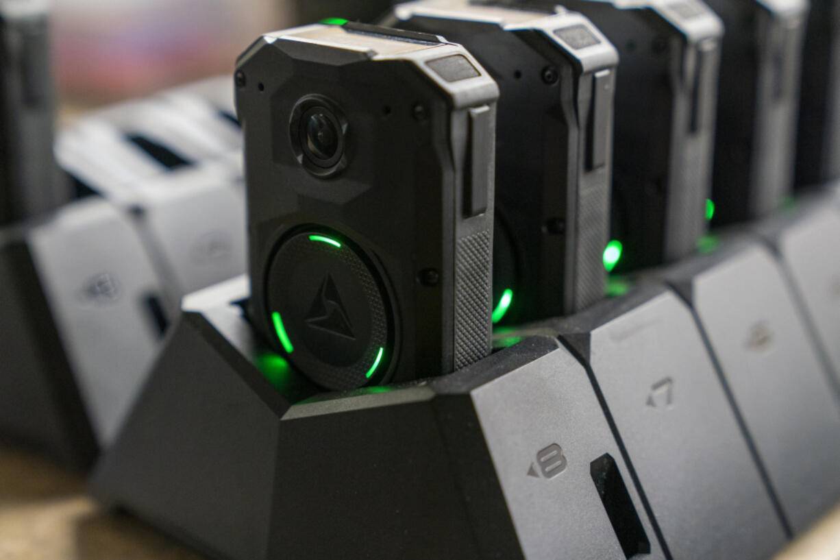 Axon body cameras charge on a docking station at Oklahoma City police headquarters on Friday, May 31, 2024 in Oklahoma City, Oklahoma.