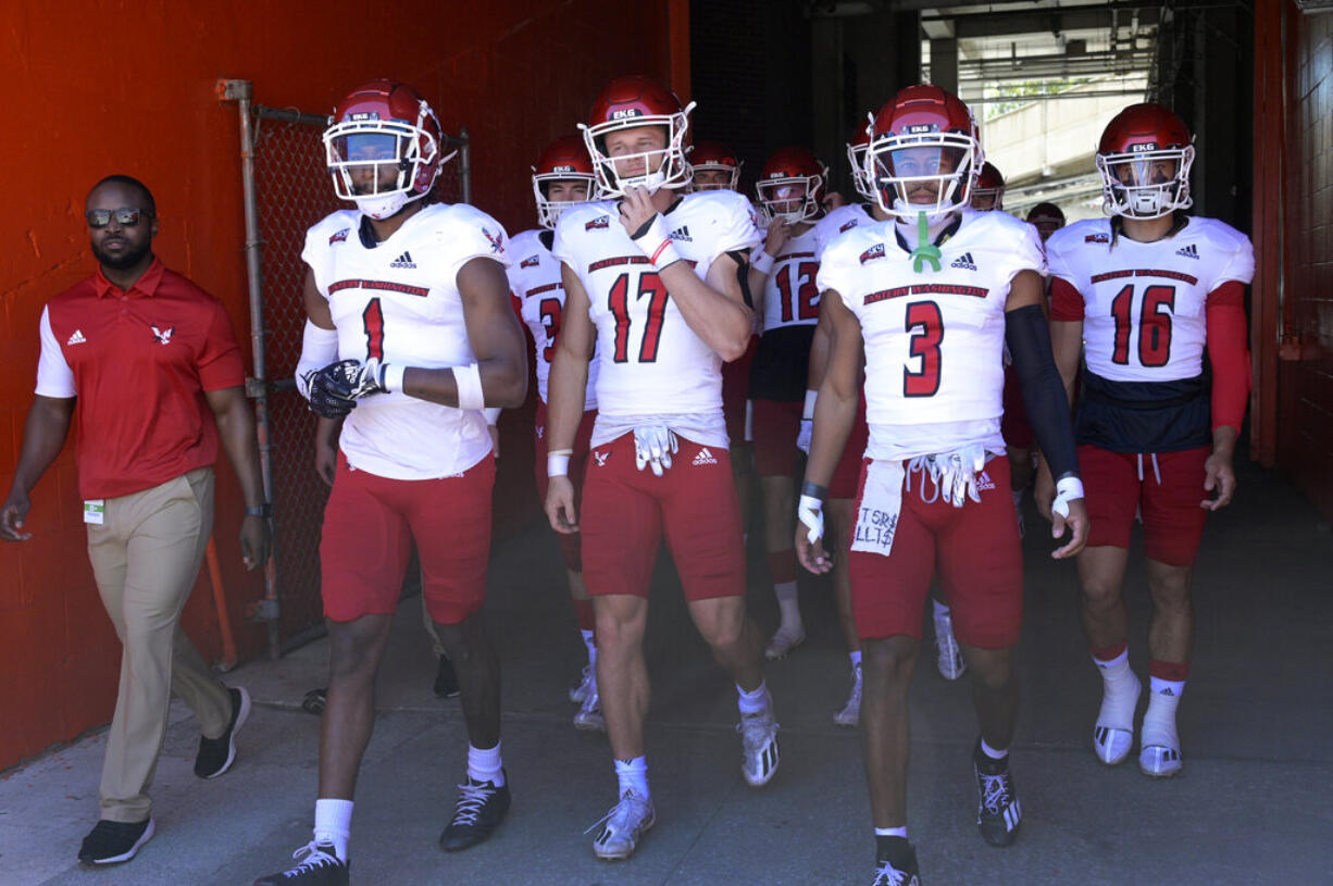 Eastern Washington's Freddie Roberson (1), Nolan Ulm (17), Anthony Stell Jr. (3) and Kekoa Visperas (16) walk onto the field before an NCAA college football game against Florida, Sunday, Oct. 2, 2022, in Gainesville, Fla. (AP Photo/Phelan M.