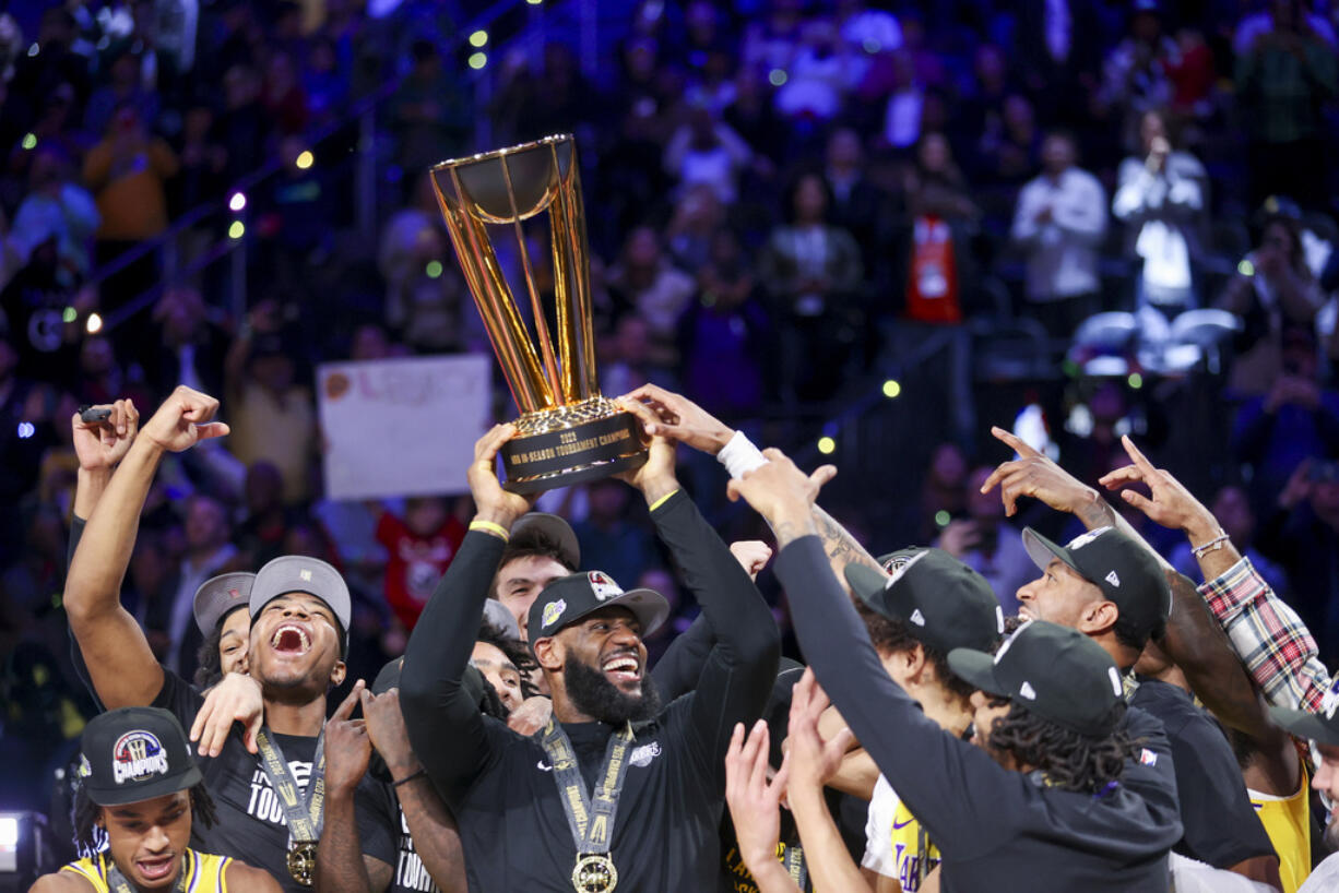 LeBron James, center, and the Los Angeles Lakers open defense of the NBA Cup on Nov. 15, 2024, at the San Antonio Spurs, the NBA announced on Tuesday, Aug. 13, 2024.