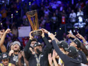 LeBron James, center, and the Los Angeles Lakers open defense of the NBA Cup on Nov. 15, 2024, at the San Antonio Spurs, the NBA announced on Tuesday, Aug. 13, 2024.