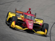 Alex Palou drives during an IndyCar auto race, Sunday, July 14, 2024, at Iowa Speedway in Newton, Iowa.