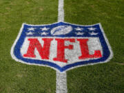 The NFL logo is displayed on the field at the Bank of American Stadium in Charlotte, N.C.