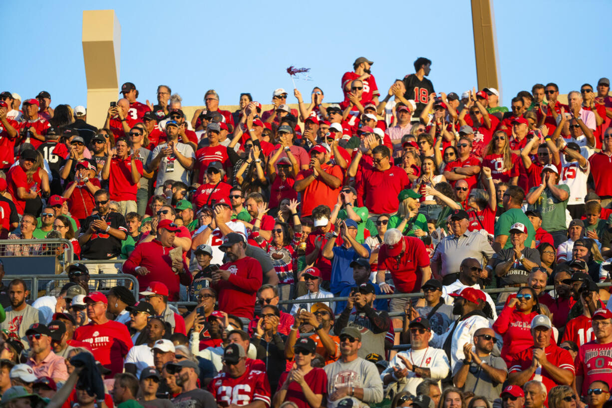 Ohio State and Nebraska are opening one or more of their preseason practices and charging admission to generate funds for their NIL collectives.