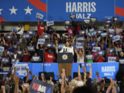 Democratic presidential nominee Vice President Kamala Harris speaks at a campaign rally Wednesday, Aug. 7, 2024, in Romulus, Mich.