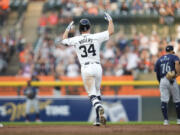 Detroit Tigers' Jake Rogers celebrates his grand slam against the Seattle Mariners in the fourth inning of a baseball game, Tuesday, Aug. 13, 2024, in Detroit.