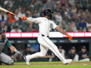 Detroit Tigers' Akil Baddoo hits a one-run walk-off double against the Seattle Mariners in the 10th inning of a baseball game, Wednesday, Aug. 14, 2024, in Detroit.