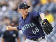 Seattle Mariners starting pitcher George Kirby delivers during the first inning of a baseball game against the Pittsburgh Pirates, Sunday, Aug. 18, 2024, in Pittsburgh.