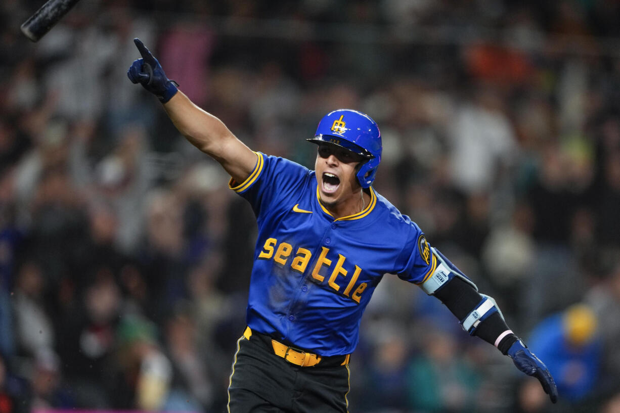 Seattle Mariners' Leo Rivas reacts to hitting a game-winning single against the San Francisco Giants during the 10th inning of a baseball game for a 6-5 win, Friday, Aug. 23, 2024, in Seattle.