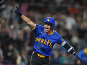 Seattle Mariners' Leo Rivas reacts to hitting a game-winning single against the San Francisco Giants during the 10th inning of a baseball game for a 6-5 win, Friday, Aug. 23, 2024, in Seattle.