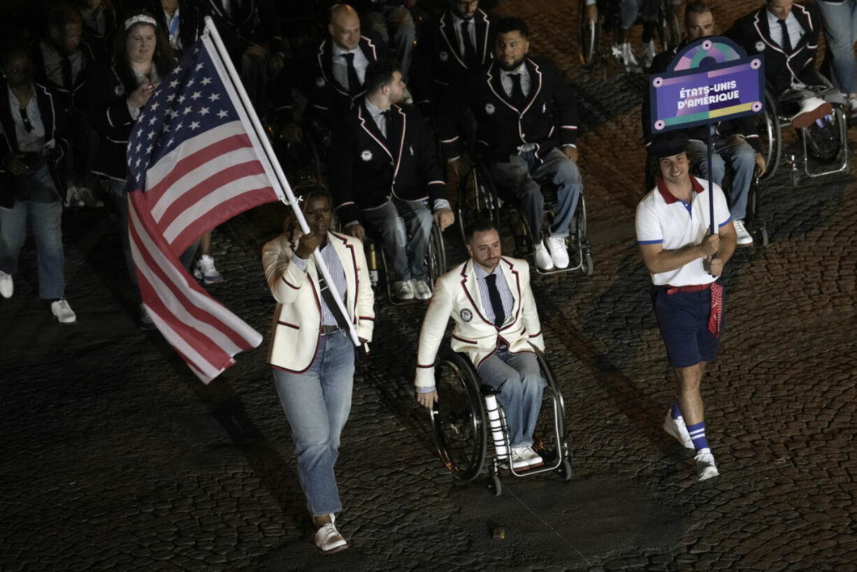 The U.S. delegation arrive for the Opening Ceremony of the 2024 Paralympics, Thursday, Aug. 29, 2024, in Paris, France.