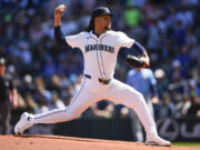 Seattle Mariners starting pitcher Luis Castillo throws against the Tampa Bay Rays during the first inning of a baseball game, Wednesday, Aug. 28, 2024, in Seattle.