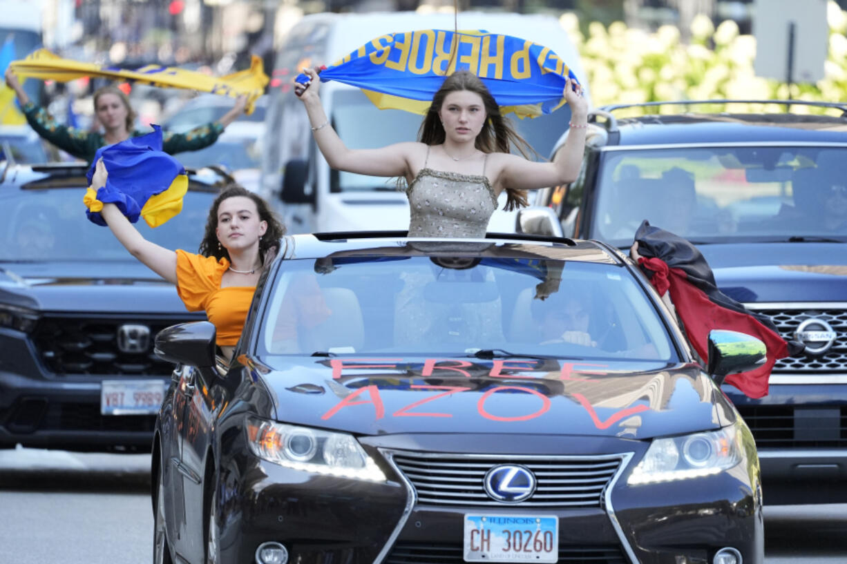 Ukrainian supporters protest before the start of the Democratic National Convention, Sunday, Aug. 18, 2024, in downtown Chicago.