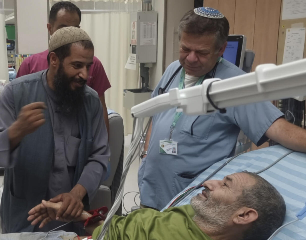 In this photo released by Soroka Medical Center on Tuesday, Aug. 27, 2024, Kaid Farhan Al-Qadi, 52, who was held hostage by Hamas militants in Gaza lies on a bed of the &rlm;Soroka Medical Center in Beersheba, Israel.