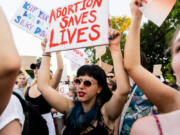 FILE - Abortion advocates rally outside the Supreme Court, June 24, 2022, in Washington.