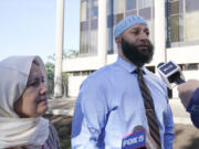 FILE - Adnan Syed and his mother Shamim Rahman talk with reporters as they arrive at Maryland&#039;s Supreme Court in Annapolis, Md., Thursday, Oct.