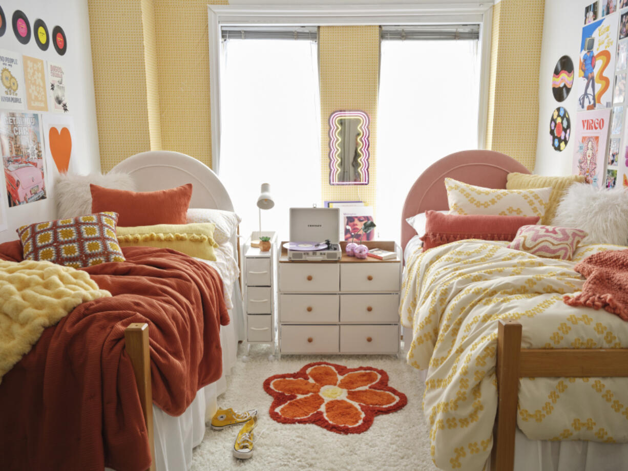 For those looking to decorate their dorm room with a theme, &rsquo;70s retro style is a popular one this year. Look for stick-on wall art and easy-to-clean pillows, throw blankets and small rugs.