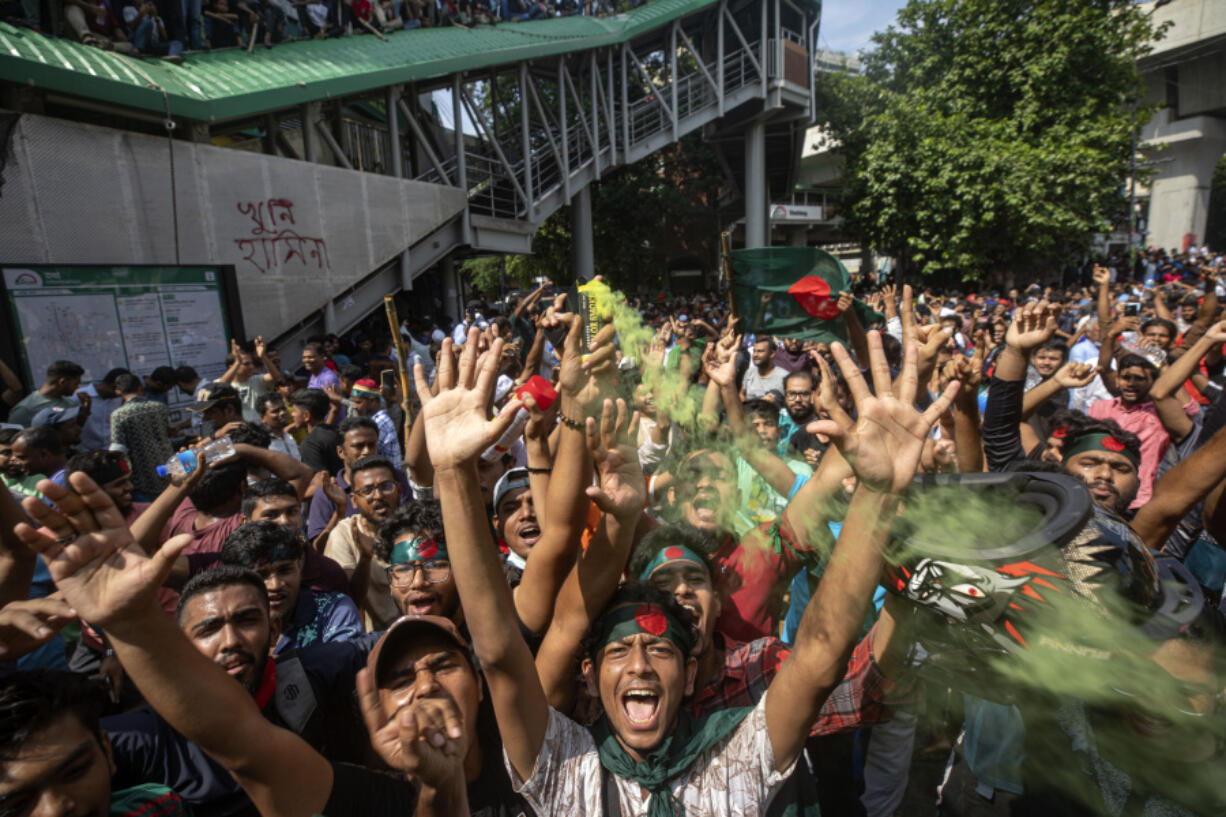 Protesters shout slogans as they celebrate Prime Minister Sheikh Hasina&rsquo;s resignation, in Dhaka, Bangladesh, Monday, Aug. 5, 2024.