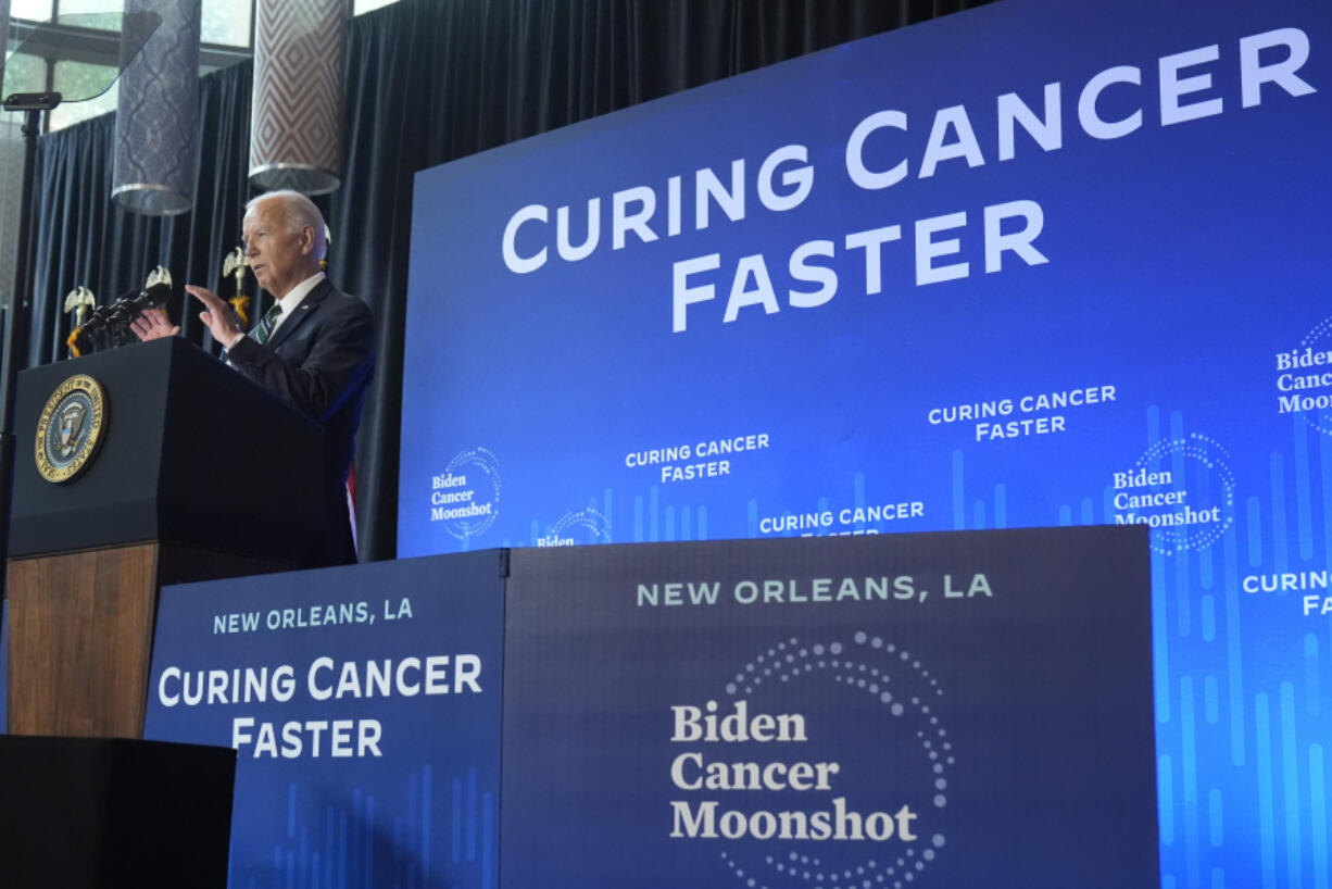 President Joe Biden speaks at Tulane University, Tuesday, Aug. 13, 2024, in New Orleans, as he promotes his &quot;moonshot&quot; initiative aimed at reducing cancer deaths.