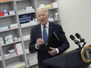 FILE - President Joe Biden leaves after speaking about prescription drug costs at the National Institutes of Health in Bethesda, Md., Dec. 14, 2023.