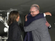 President Joe Biden and Vice President Kamala Harris greet Paul Whelan at Andrews Air Force Base, Md., following his release as part of a 24-person prisoner swap between Russia and the United States, Thursday, Aug. 1, 2024.