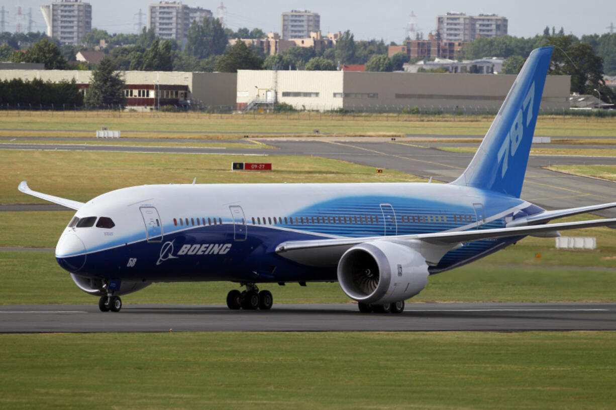 FILE - The Boeing 787 Dreamliner taxis after its landing at Le Bourget airport, east of Paris, upon its presentation for the first time at the 49th Paris Air Show at the airport, June 21, 2011.