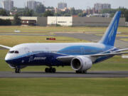 FILE - The Boeing 787 Dreamliner taxis after its landing at Le Bourget airport, east of Paris, upon its presentation for the first time at the 49th Paris Air Show at the airport, June 21, 2011.