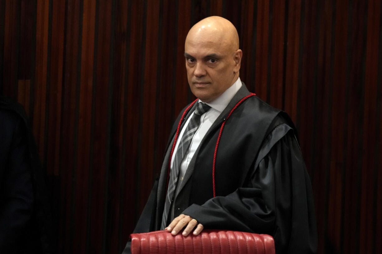 FILE - Brazilian Supreme Court Chief Justice Alexandre de Moraes arrives for a court hearing, in Brasilia, Brazil, June 22, 2023.