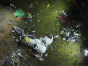 The debris at the site where an airplane crashed with 62 people on board, in Vinhedo, Sao Paulo state, Brazil, early on Saturday, Aug. 10, 2024. Brazilian authorities are working to piece together what exactly caused the plane crash in Sao Paulo state the previous day, killing all 62 people aboard.