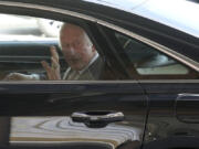 Britain&rsquo;s King Charles III waves as he leaves after meeting representatives from Merseyside&rsquo;s emergency services and local community groups at the Community Fire Station in Southport, England, Tuesday, Aug.