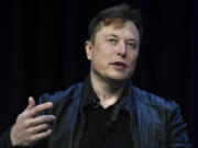 FILE - Tesla and SpaceX CEO Elon Musk speaks at the SATELLITE Conference and Exhibition in Washington, March 9, 2020. The British government on Tuesday, Aug. 6, 2024, has called on Musk to act responsibly after one of the world&rsquo;s richest men used his social media platform to unleash a barrage of posts that risked inflaming the violent unrest gripping the country.