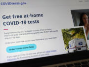 FILE - A United States government website, COVIDTests.gov, is displayed on a computer, Jan. 19, 2022, in Walpole, Mass.