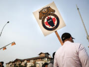 Teamsters Canada Rail Conference members picket outside the CPKC headquarters in Calgary, Alta., Friday, Aug. 23, 2024.