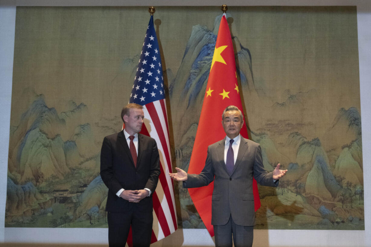 Wang Yi, right, the director of the Communist Party&rsquo;s Central Foreign Affairs Commission Office speaks before a talk with White House national security adviser Jake Sullivan, left, before their talk at Yanqi lake in Beijing, Tuesday, Aug. 27, 2024.