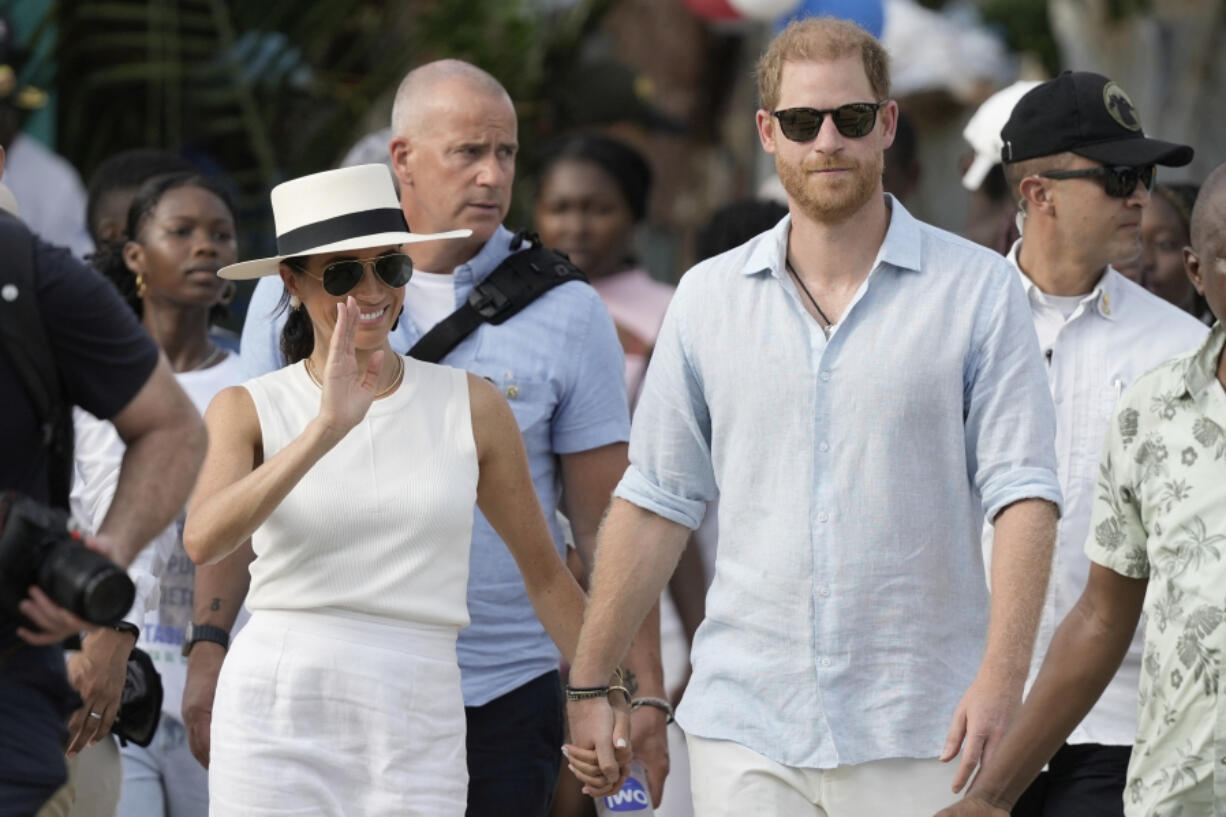 Prince Harry and Meghan arrive Aug. 17 in San Basilio de Palenque, Colombia.