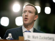 FILE - Facebook CEO Mark Zuckerberg testifies before a joint hearing of the Commerce and Judiciary Committees on Capitol Hill in Washington, April 10, 2018.